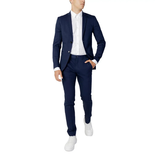 Navy blue tailored Jack and Jones spring summer suit with matching trousers and white dress shirt for men