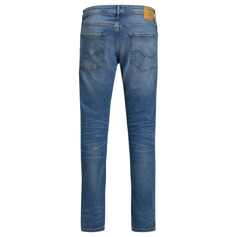 Jack & jones blue men’s denim jeans with faded wash and classic back pockets shown from the back side
