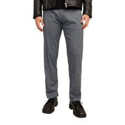 Men’s gray patterned cotton stretch trousers with black leather jacket and dark brown dress shoes