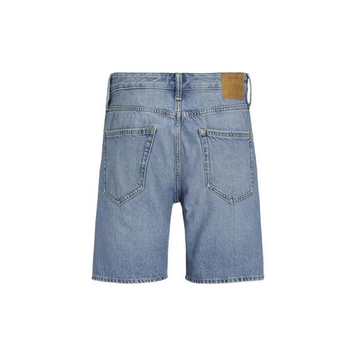 Blue denim shorts with back pockets and a brown leather patch on the right side.