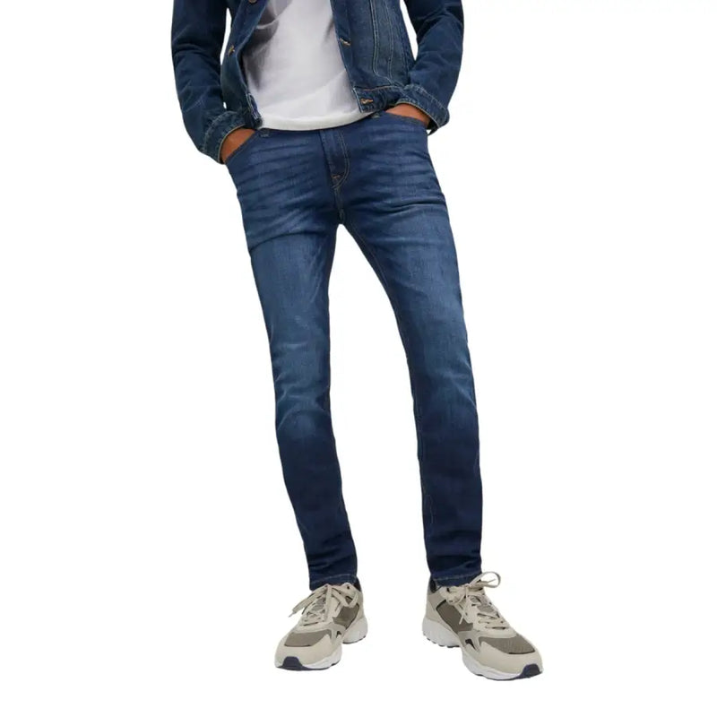 Jean slim bleu foncé en denim stretch uni bleu pour homme Jack and Jones, avec un aspect usé et des coutures classiques (réf. 12110056).