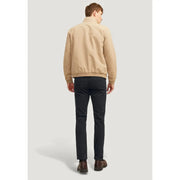 Beige bomber jacket with classic collar and ribbed cuffs paired with jack and jones men cotton black trousers