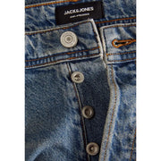 Blue denim jack and jones men light blue ripped jeans with black brand label and silver toned buttons in cotton elastane