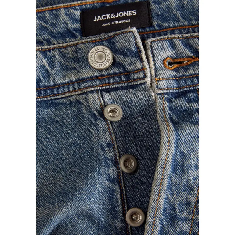 Blue denim jack and jones men light blue ripped jeans with black brand label and silver toned buttons in cotton elastane