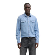 Chemise en denim bleu clair à boutons de la marque Jack Jones, avec deux poches poitrine et boutons argentés, pour homme