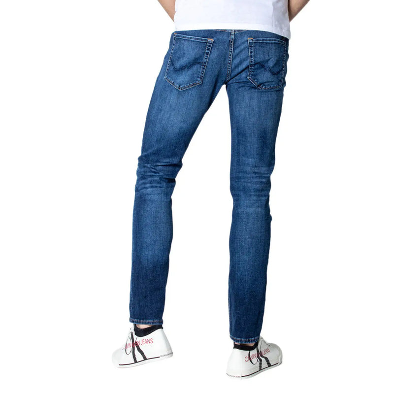 Jack & jones men’s blue slim fit denim jeans showing classic back pockets from the backside view