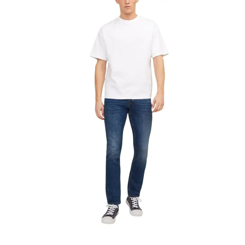 White crew-neck cotton t-shirt paired with jack & jones men’s blue worn-out effect dark wash denim jeans