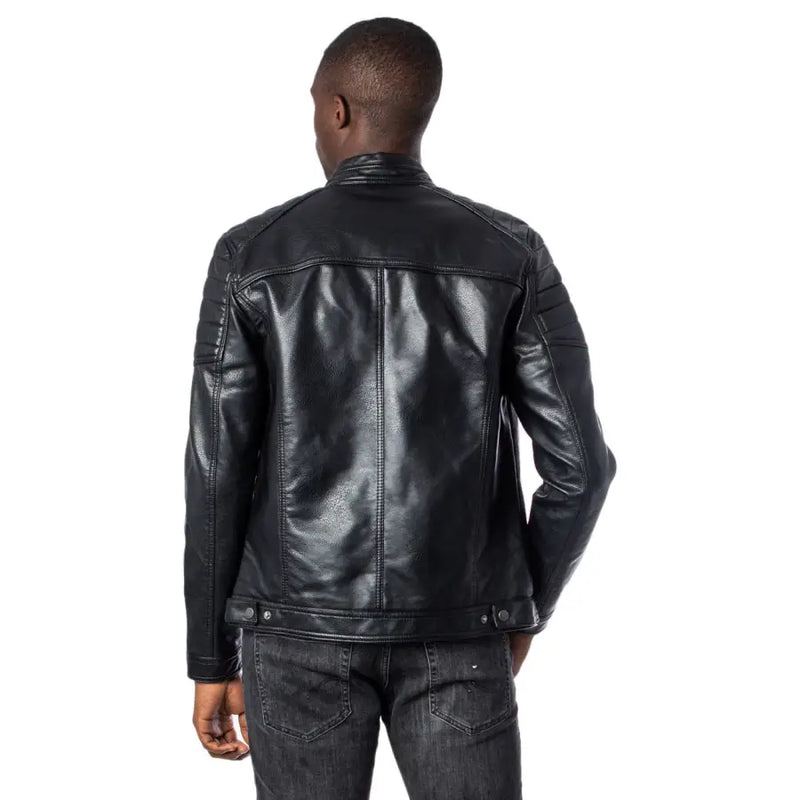 Men’s black faux leather biker jacket with ribbed details paired with dark wash jeans