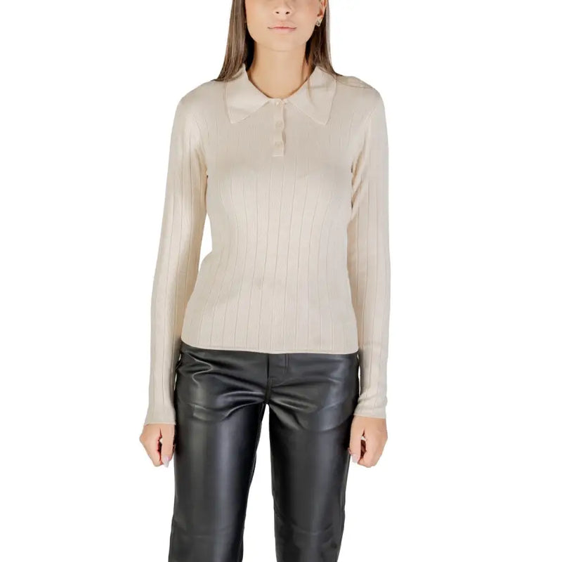 Ribbed long-sleeve polo shirt in a light neutral color displayed with Jacqueline De Yong Beige Classic Round Neck Knit Cardigan