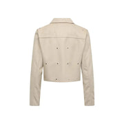 Beige cropped leather jacket with silver studs on shoulders back and sleeves for a stylish edgy look