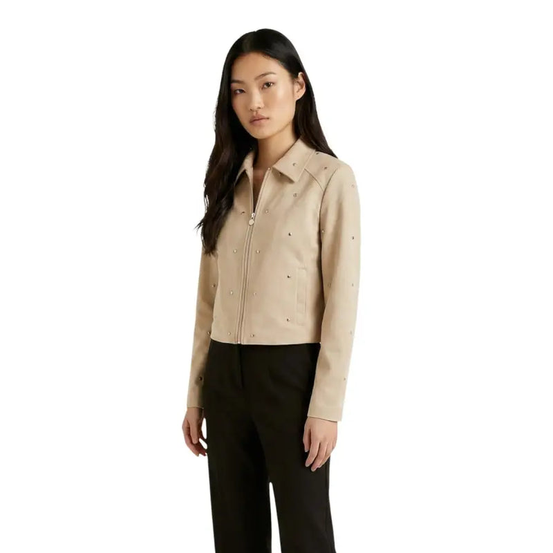 Jacqueline de yong beige leather jacket with subtle silver stud detailing along front zipper and shoulders