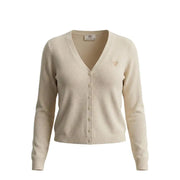 Cream-colored Jacqueline de Yong long jlv knit cardigan with v-neck button-front closure and heart embroidery