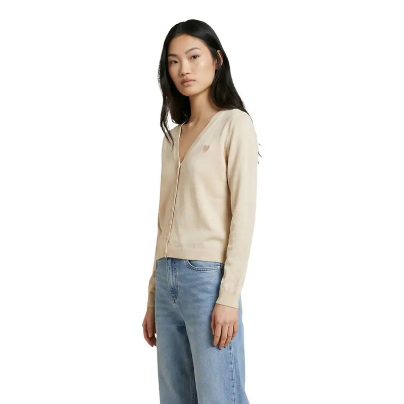 Beige knit long button cardigan by Jacqueline de Yong with subtle heart embroidery on left chest
