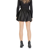 Jacqueline de yong black mini skirt with flared ruffled hem and subtle white polka dots for women