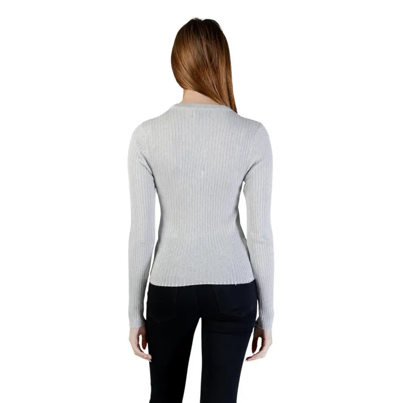 A light gray ribbed knit long sleeve sweater with a fitted silhouette from jacqueline de yong silver knitwear collection