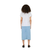 Light blue denim midi skirt paired with jacqueline de yong white short sleeve v neck linen viscose blouse