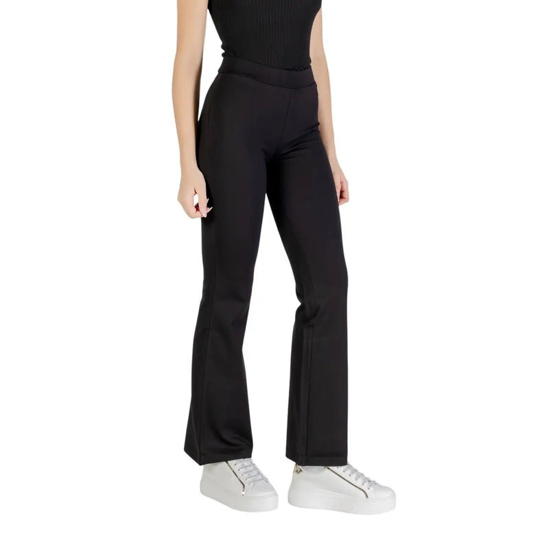 Black high-waisted flared viscose trousers for women by jacqueline de yong with smooth stretchy fabric and side seam detailing