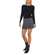 A sleek dark gray pleated mini skirt with a structured waistband made of polyester elastane by jacqueline de yong