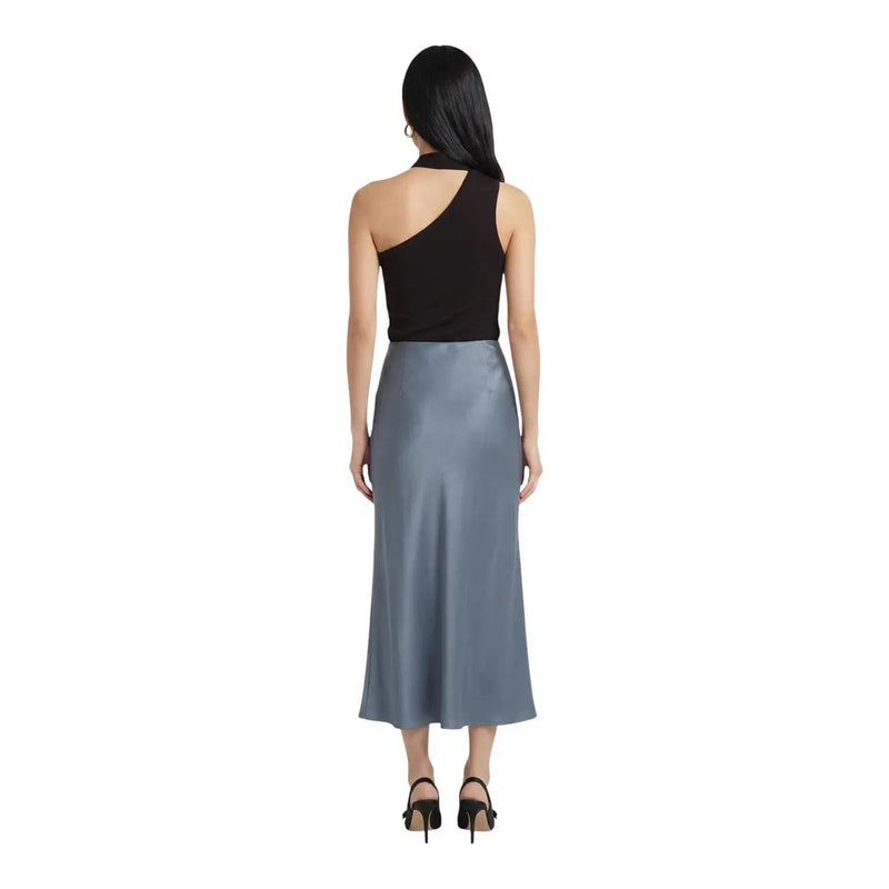 A sleek slate-blue satin midi skirt with a flowing silhouette and high waist paired with jacqueline de yong brown lyocell scarf top