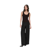 Black sleeveless tank top with scalloped neckline and matching wide-leg trousers from Jacqueline de Yong women’s collection