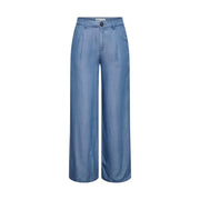 Light blue wide-leg lyocell trousers for women by jacqueline de yong with smooth shiny fabric and button closure