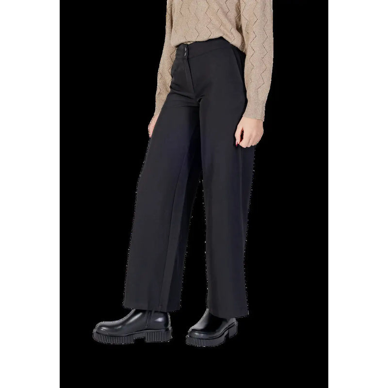 Black wide-leg polyester trousers by Jacqueline de Yong with a tailored fit and subtle front pleats