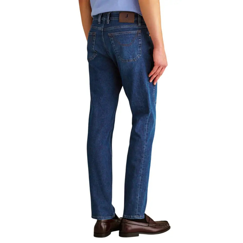 Blue denim jeckerson men jeans with classic straight-leg cut and brown leather patch on waistband in organic cotton