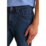 Back side of jeckerson men jeans blue organic cotton slim fit with dark blue denim copper buttons and embroidered logo