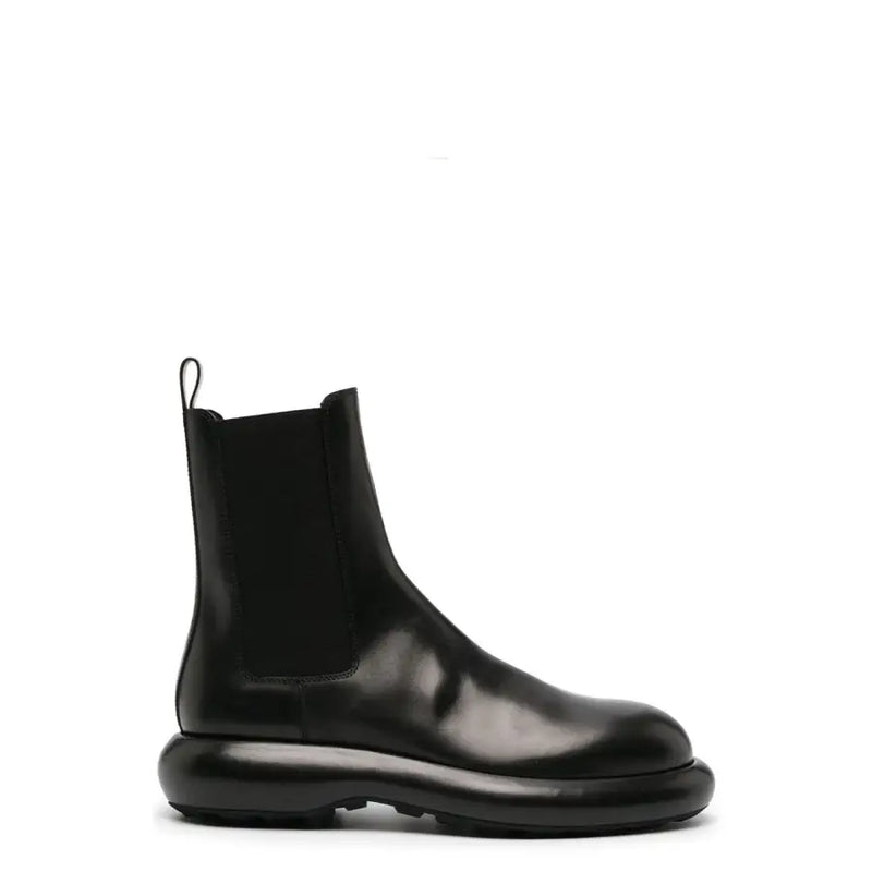 Jil sander men black leather chelsea ankle boot with chunky glossy sole and elastic side panels fall winter collection