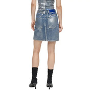 Back view of a karl lagerfeld jeans light blue denim mini skirt with metallic sheen cotton fabric and two pockets