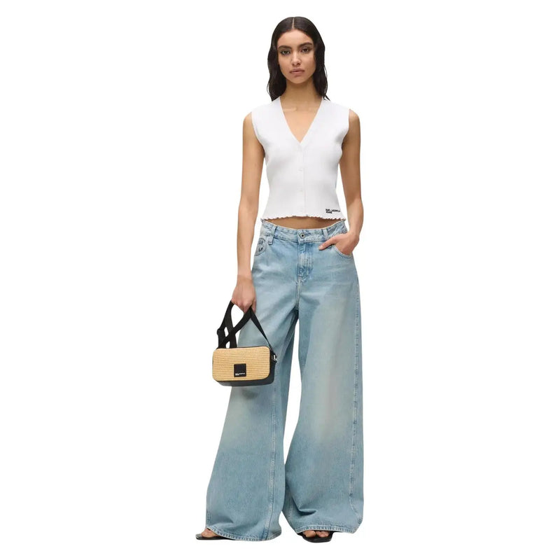 Karl Lagerfeld jeans women knit tank top white v neck buttons shown with a beige woven straw handbag with black trim accents