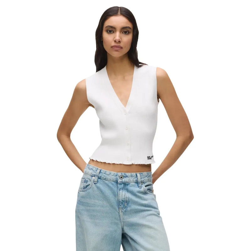 White sleeveless knit tank top by Karl Lagerfeld Jeans featuring a v neck button front and frayed hem