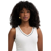 A woman wearing a white ribbed tank top with black trim by Karl Lagerfeld made of beige viscose