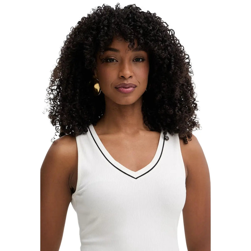 A woman wearing a white ribbed tank top with black trim by Karl Lagerfeld made of beige viscose