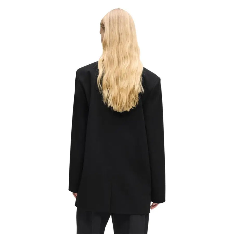 Black oversized blazer by Karl Lagerfeld Jeans featuring a structured yet relaxed fit with a lapel collar