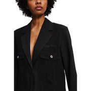 Woman wearing Karl Lagerfeld long black blazer with front pockets and silver buttons