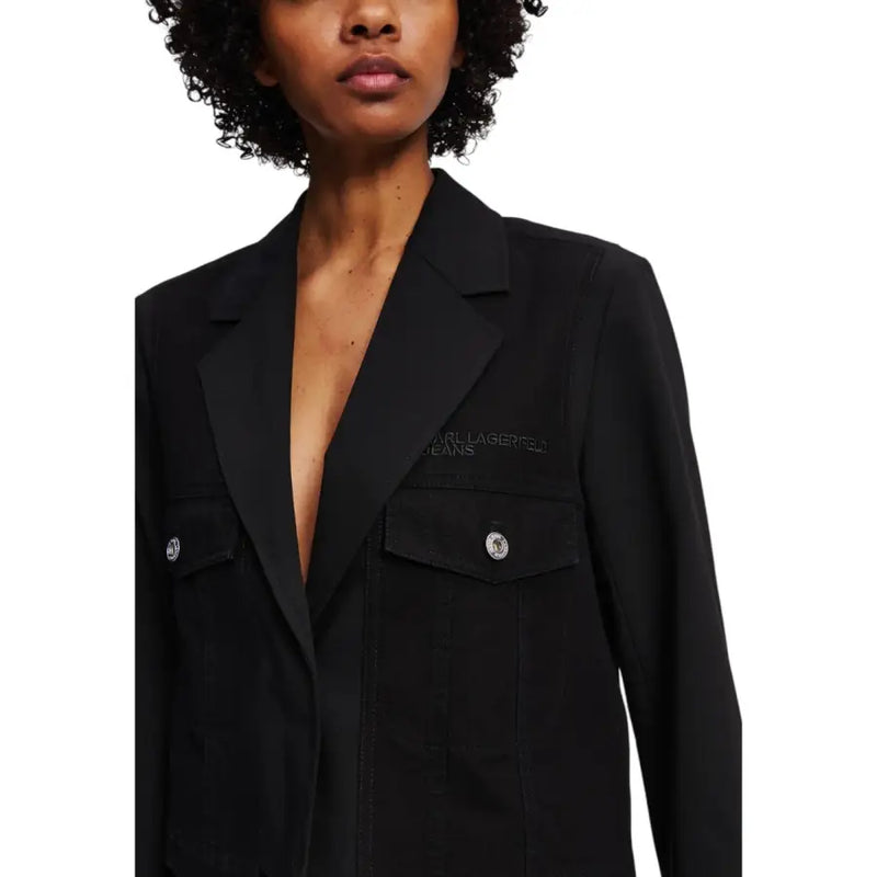 Woman wearing Karl Lagerfeld long black blazer with front pockets and silver buttons