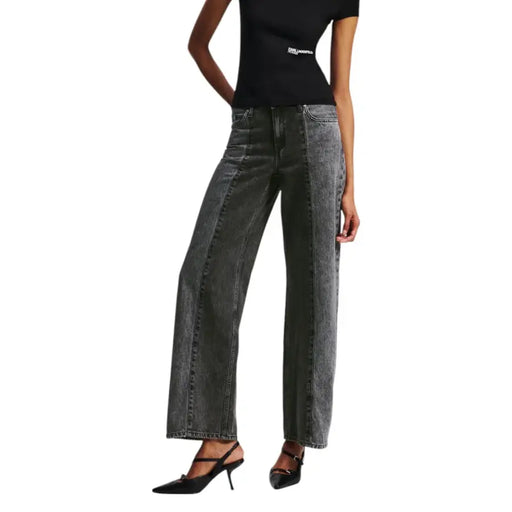 Woman wearing Karl Lagerfeld Black Cotton Jeans with two-tone wash and black slingback heels