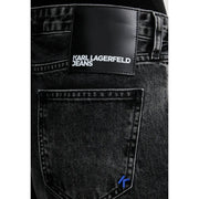 Black denim jeans with black leather karl lagerfeld patch and blue embroidered logo on pocket made from organic cotton