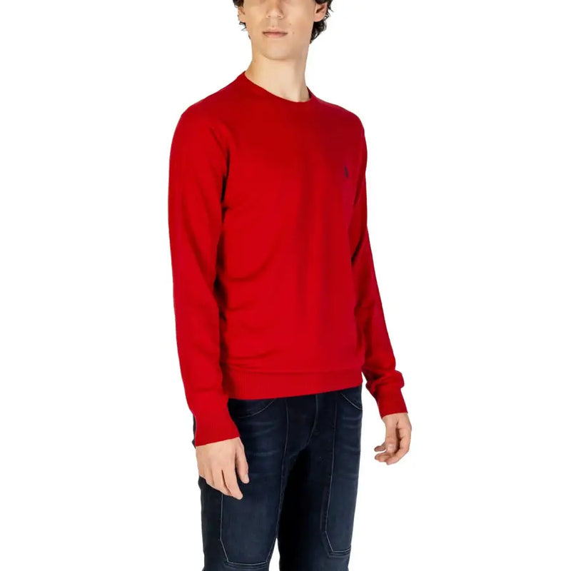 Red polo sweater with small embroidered logo on chest, made of cotton and polyester blend.