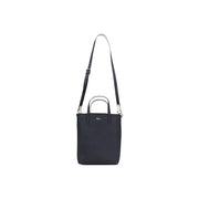 Lacoste black zip handbag tote bag with silver-tone hardware and contrasting white shoulder strap and inner pouch