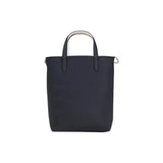 Lacoste black leather tote bag with contrasting white handles silver hardware and zip shoulder strap with inner pouch