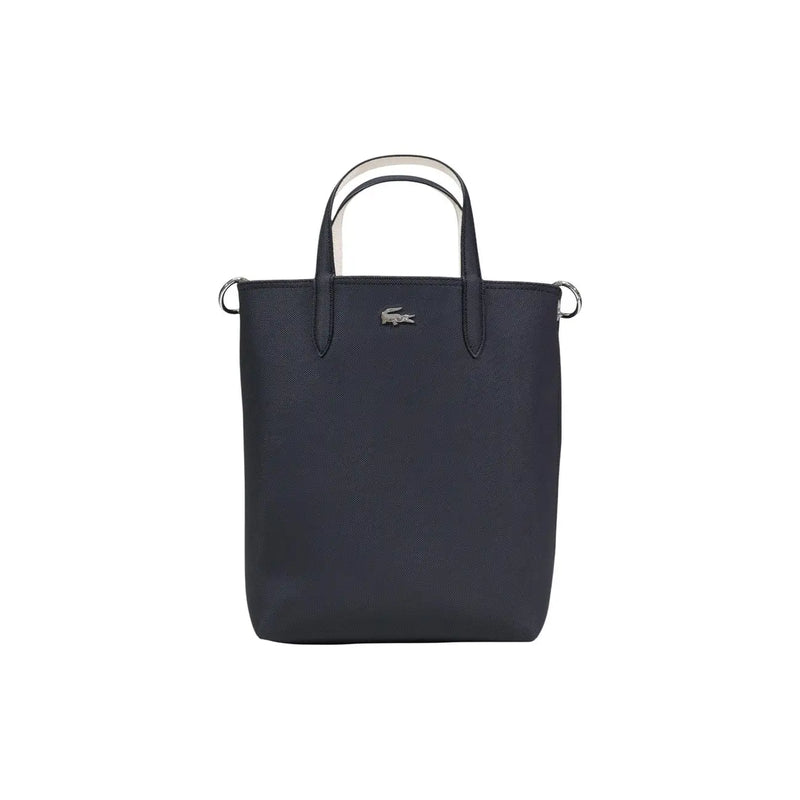 Lacoste black zip handbag tote with textured fabric and contrasting white handles featuring shoulder strap and inner pouch