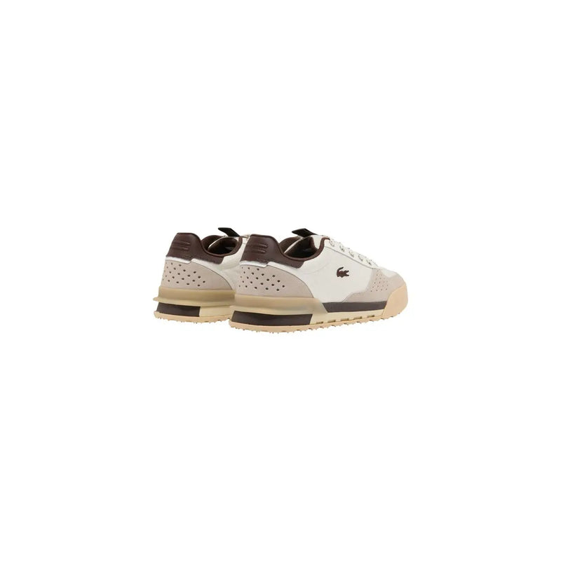 Baskets Lacoste Slam Break pour homme en cuir marron, avec tige en cuir blanc perforé et semelle en caoutchouc ornée du logo crocodile.