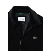 Schwarzer Lacoste Herren-Baumwollblazer aus Cord mit grünem Krokodil-Logo auf der Brust und passendem Kragen