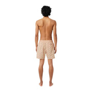 Beige Lacoste Herren-Badeshorts aus Polyester mit rosa Print, dezentem grünem Blattmuster und elastischem Bund