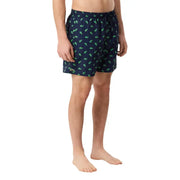Dark blue Lacoste men swimwear swim trunks with bright green crocodile pattern and embroidered logo on lower left leg