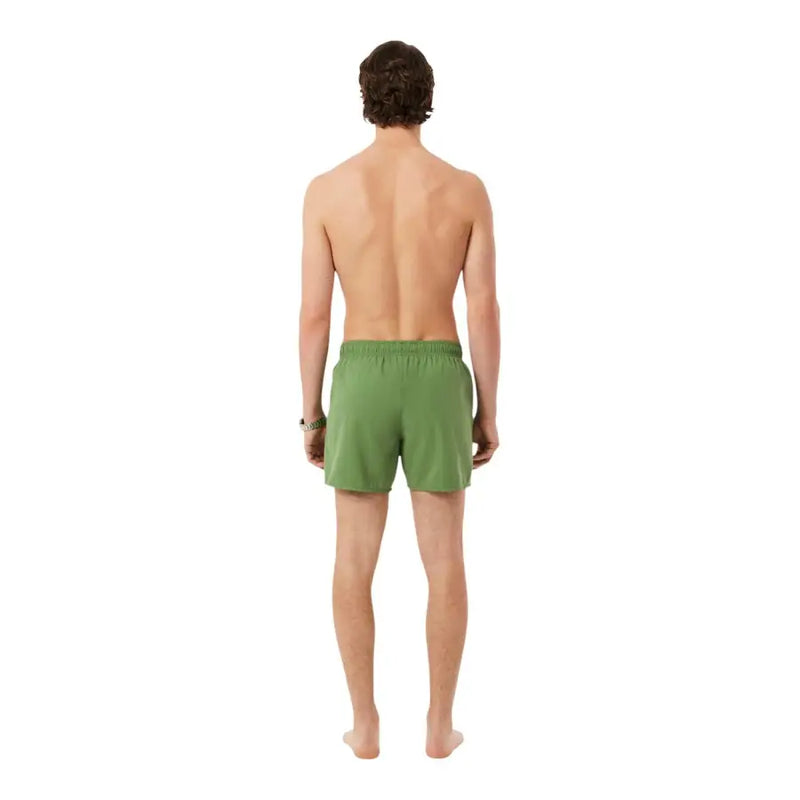 Lacoste men swimwear olive green elastic waist swim trunks designed for comfortable beachwear and swimming