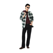 A man wearing a Lacoste mens Bordeaux cotton t shirt paired with a black and white plaid flannel shirt and dark jeans