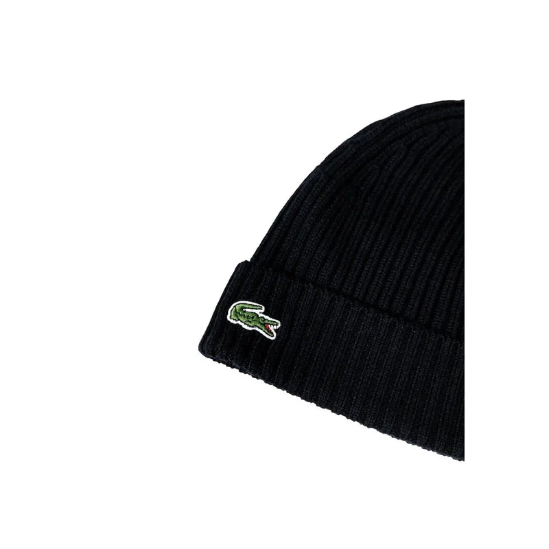 Lacoste wool cap for men in black with ribbed knit and green embroidered crocodile logo on folded cuff front view